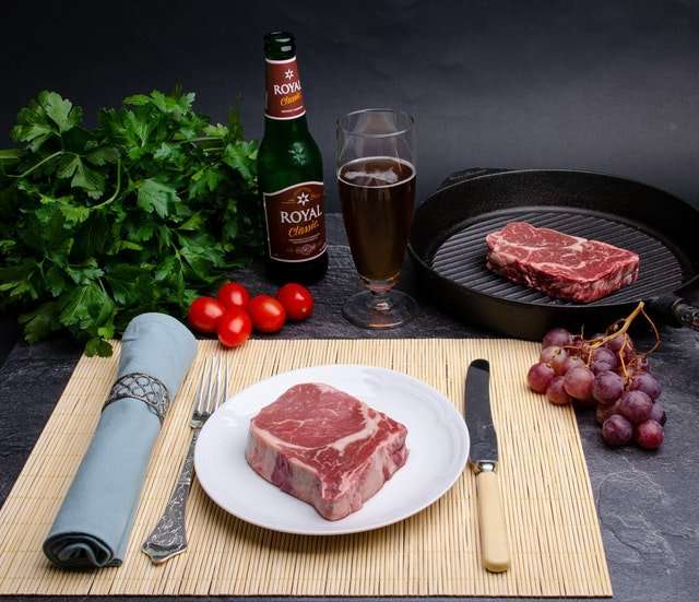 wagyu beef in a skillet on a table