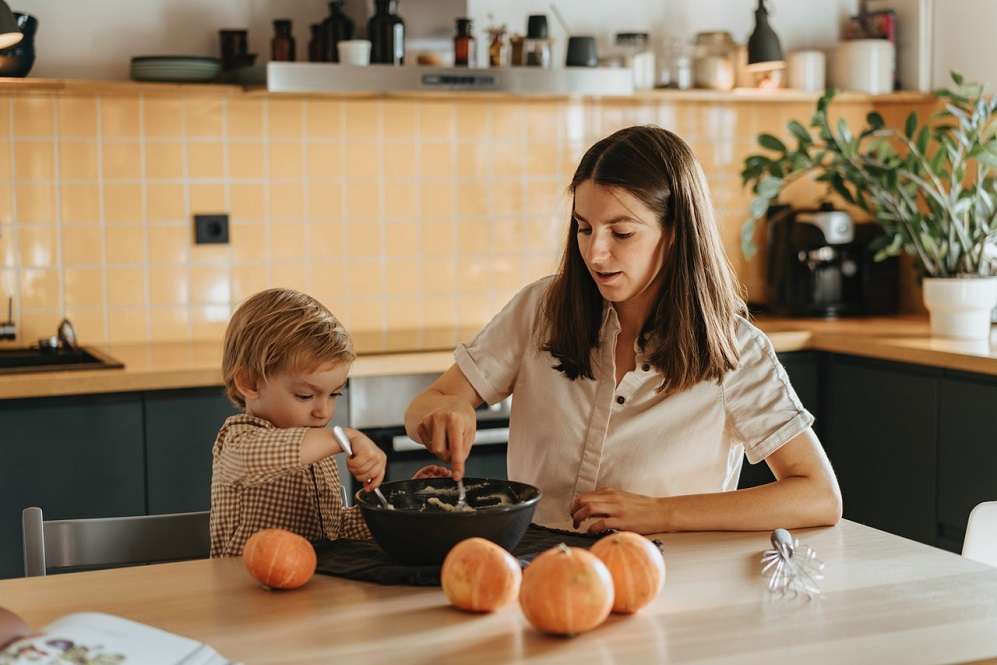 mother cooking with children